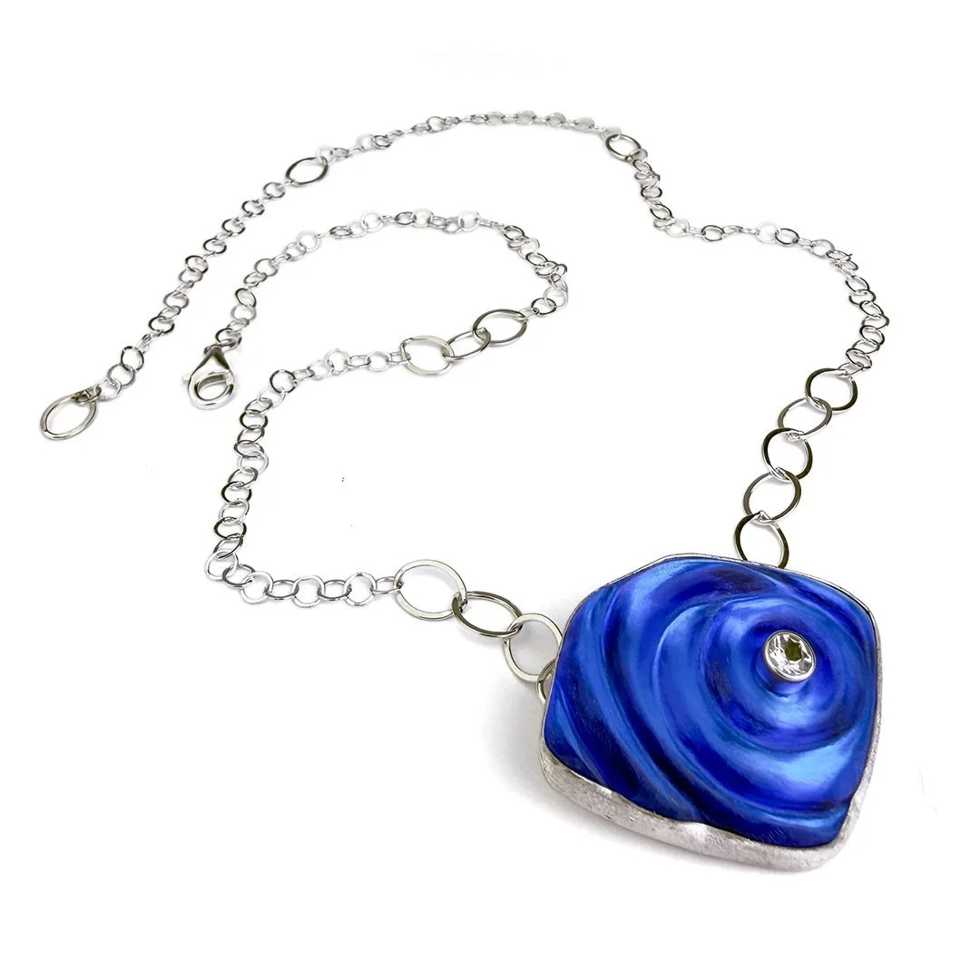 blue-orbit-ripple-necklace-glass-topaz.jpg