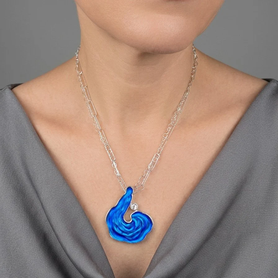 blue-vortex-wave-necklace-on-model.jpg