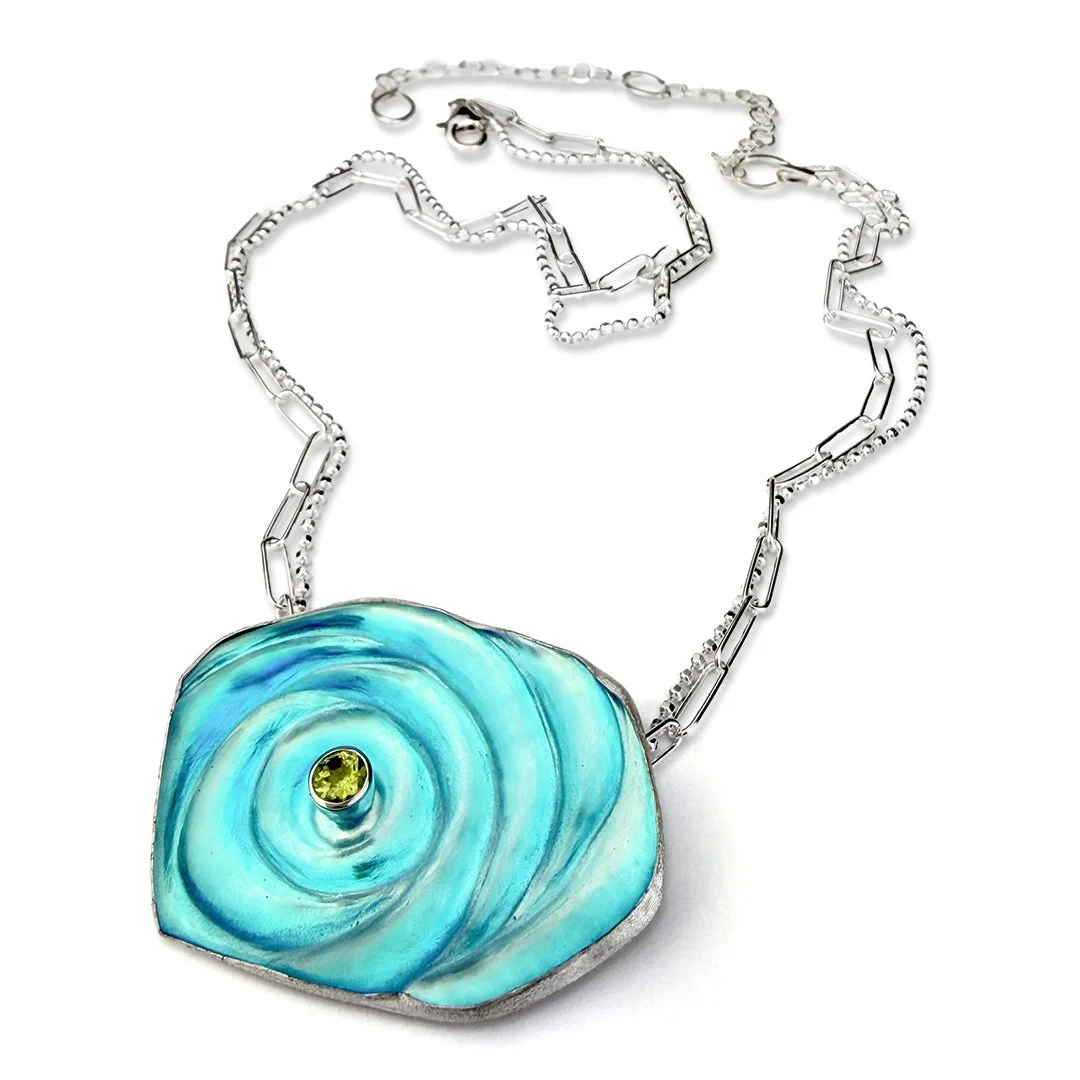 auqa-orbit-ripple-necklace-glass-peridot.jpg