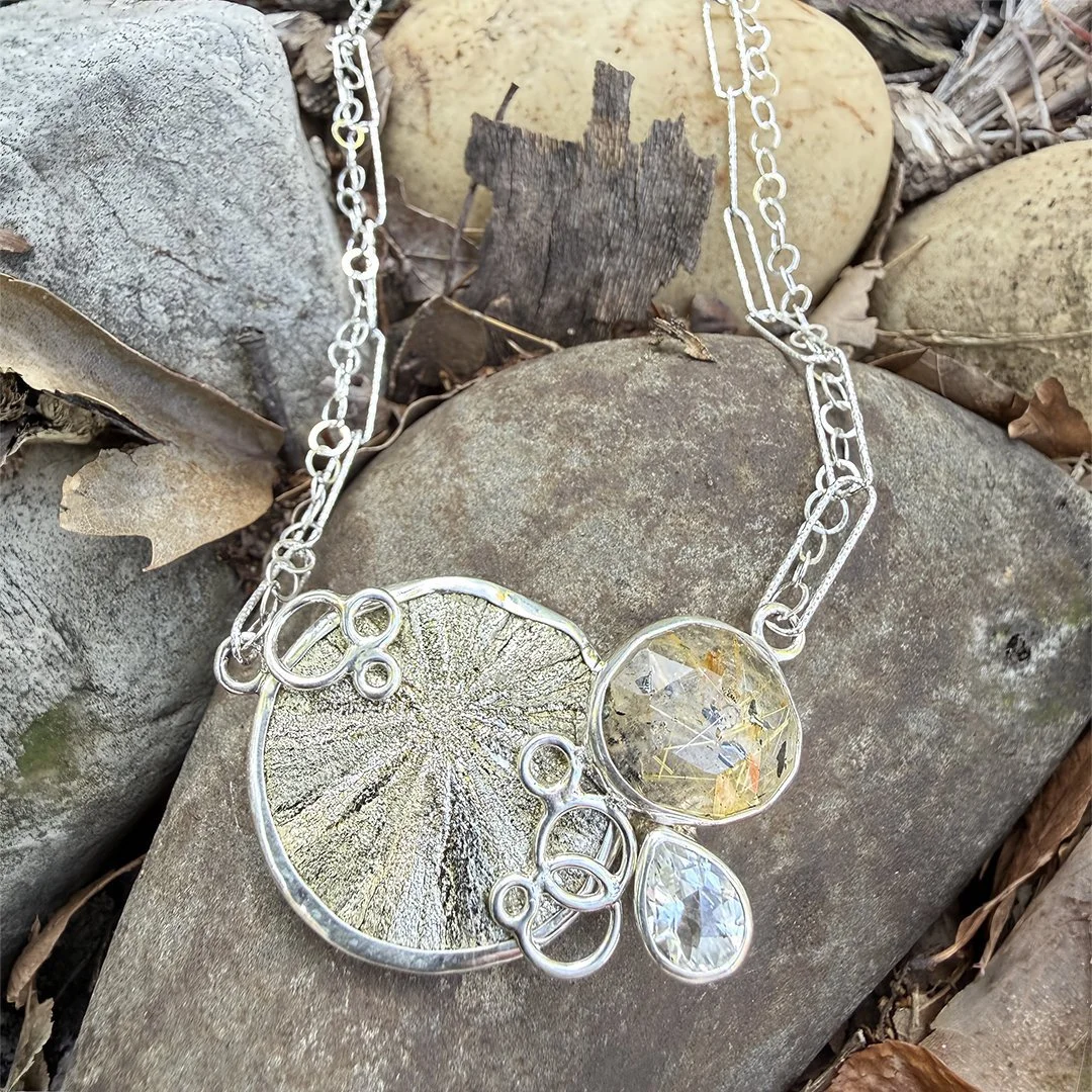 sundial-necklace-in-nature.jpg
