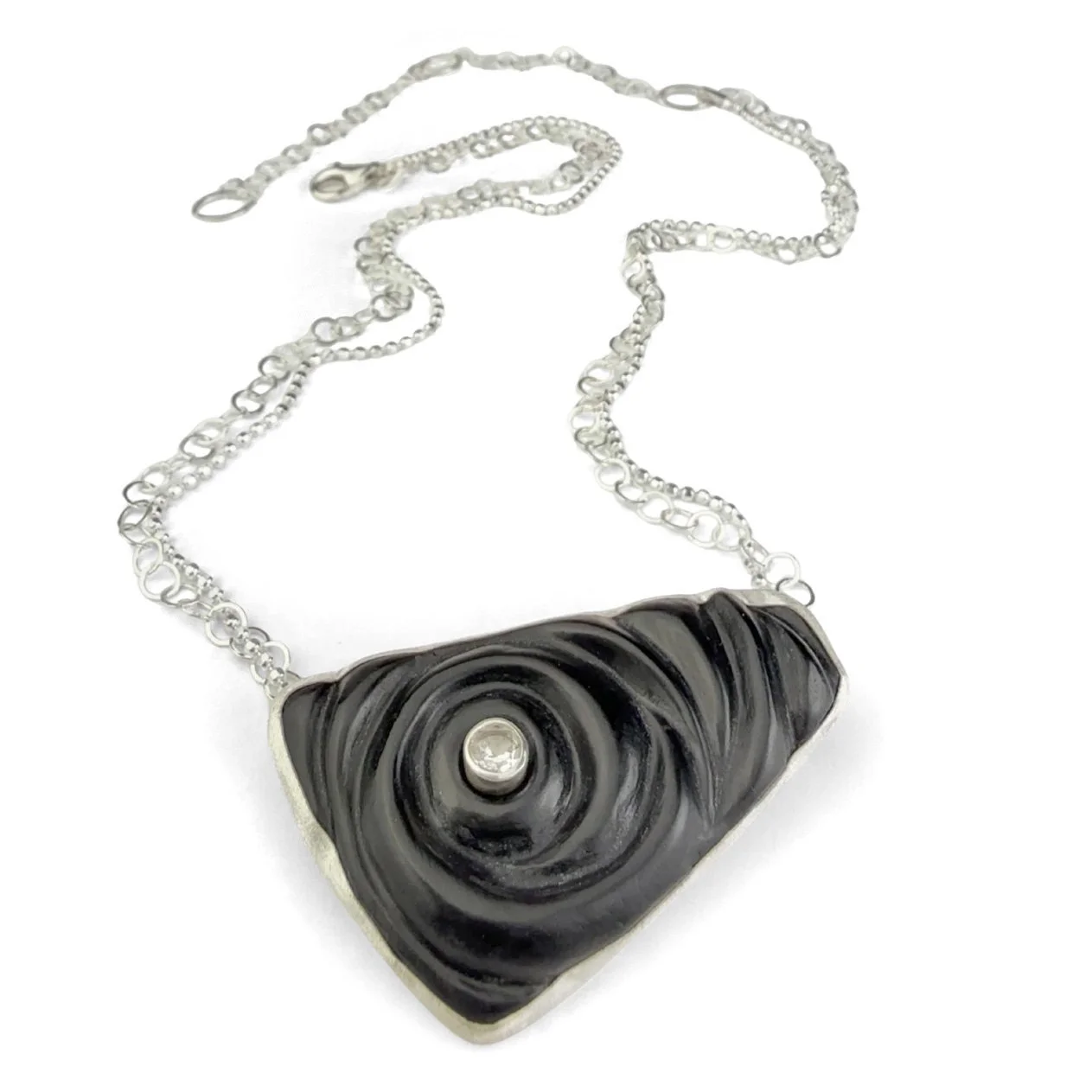 black-orbit-ripple-necklace-with-topaz.jpg