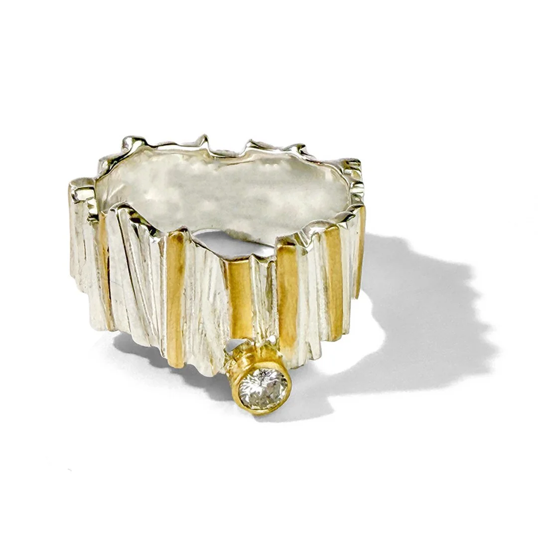 crescendo-ring-diamond-gold-silver.jpg