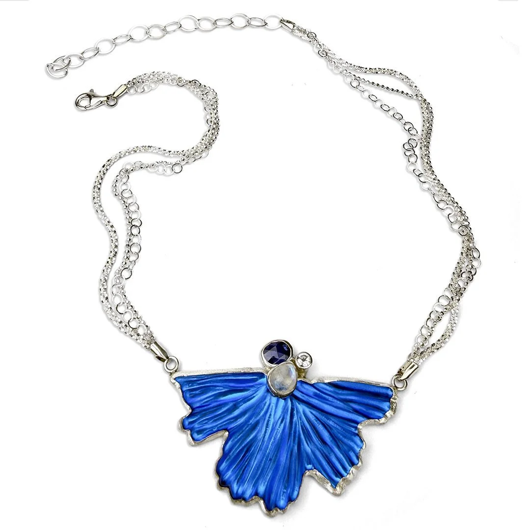 wild-bloom-carved-glass-necklace-with-sapphire-topaz-moonstone.jpg