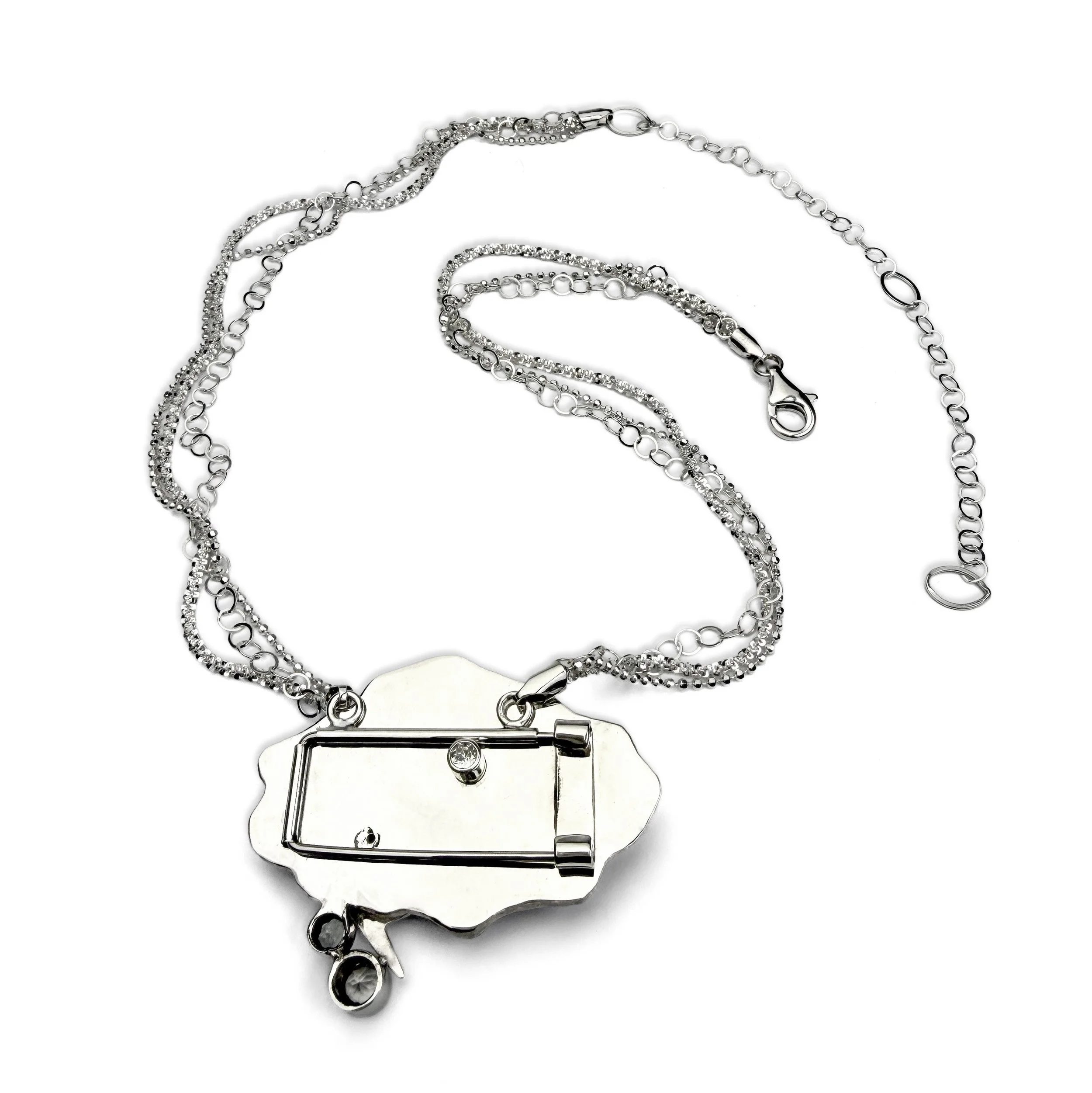 Storm-Cloud-Pin-Pendant-back-with-chain.jpg