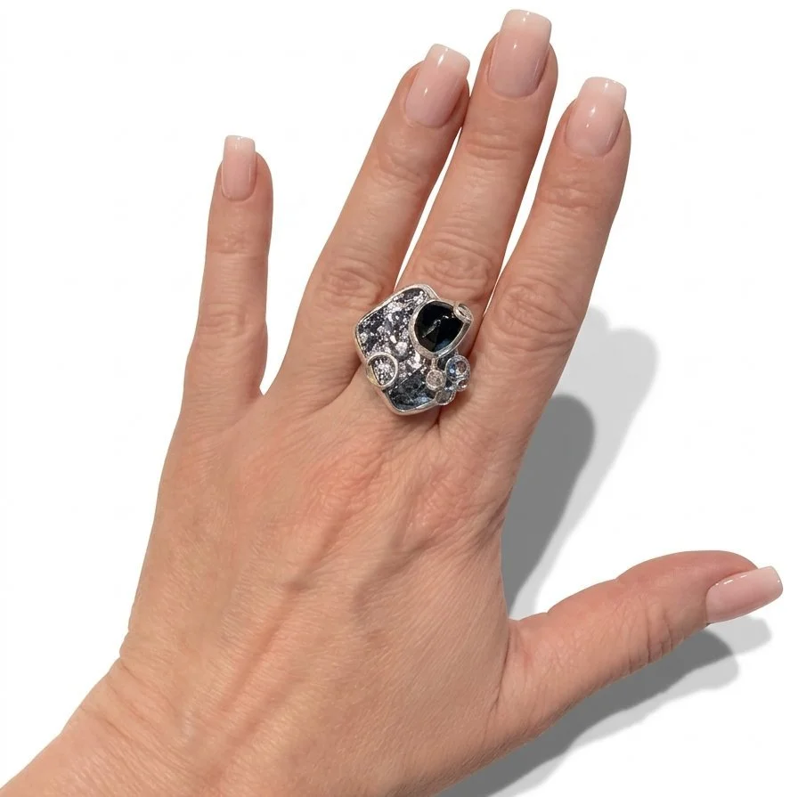 Cosmic-reef-silica-spinel-cocktail-ring-on-hand.jpg