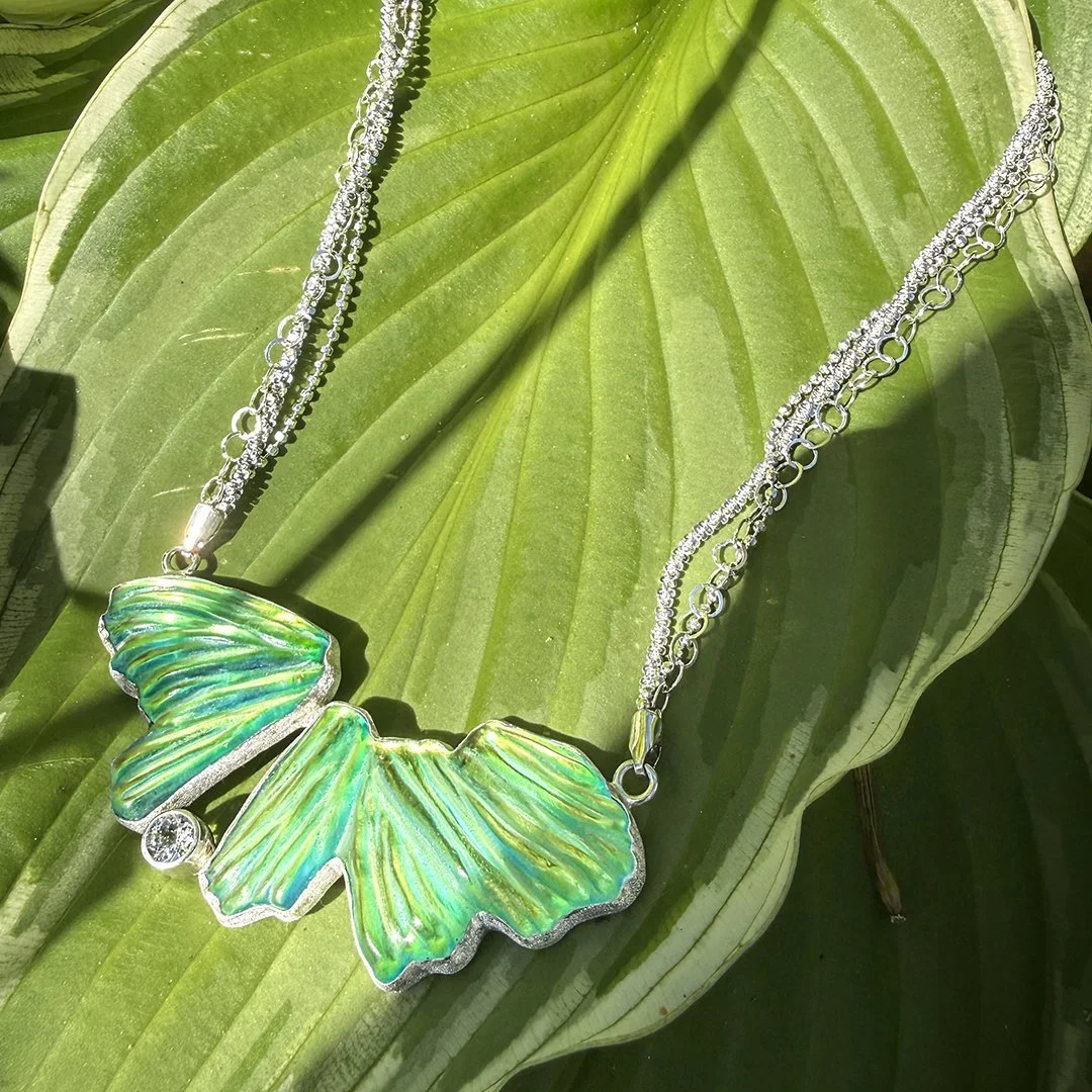 transformation-necklace-on-leaves.jpg