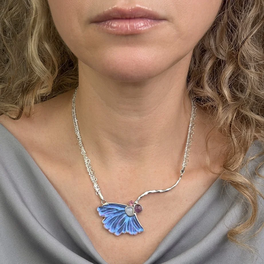Windflower-necklace-carved-glass-moonstone-rhidolite-amethyst-on-model.jpg