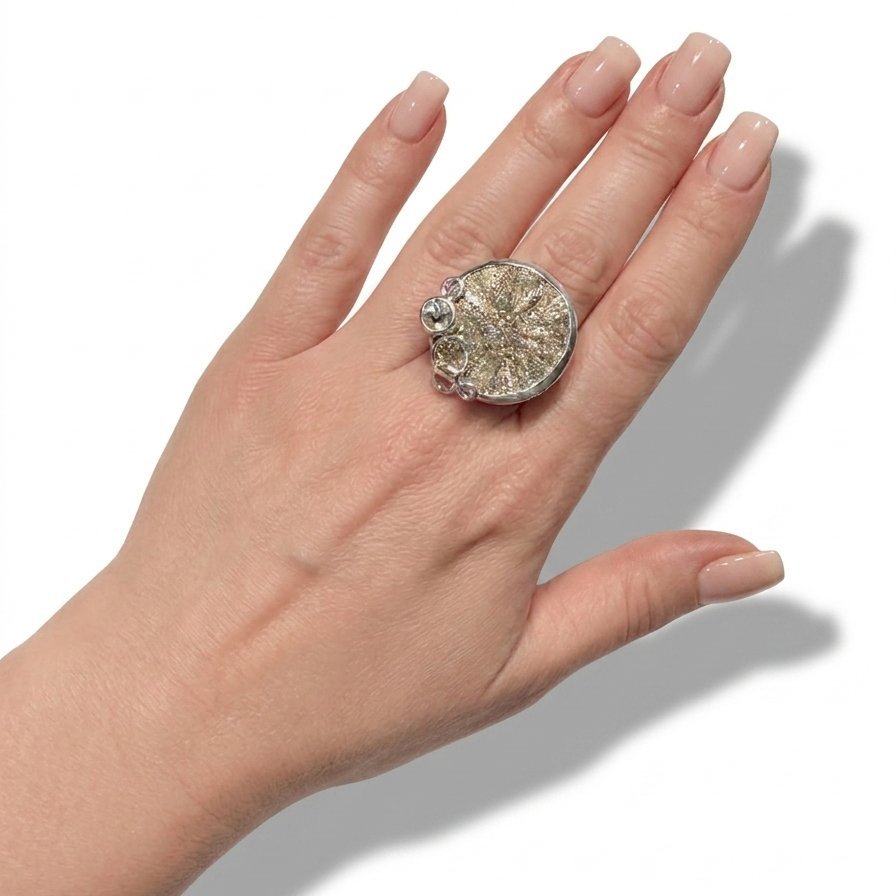 sundial-statement-ring-natural-pyrite-sun-white-topaz-on-model-hand-web.jpg