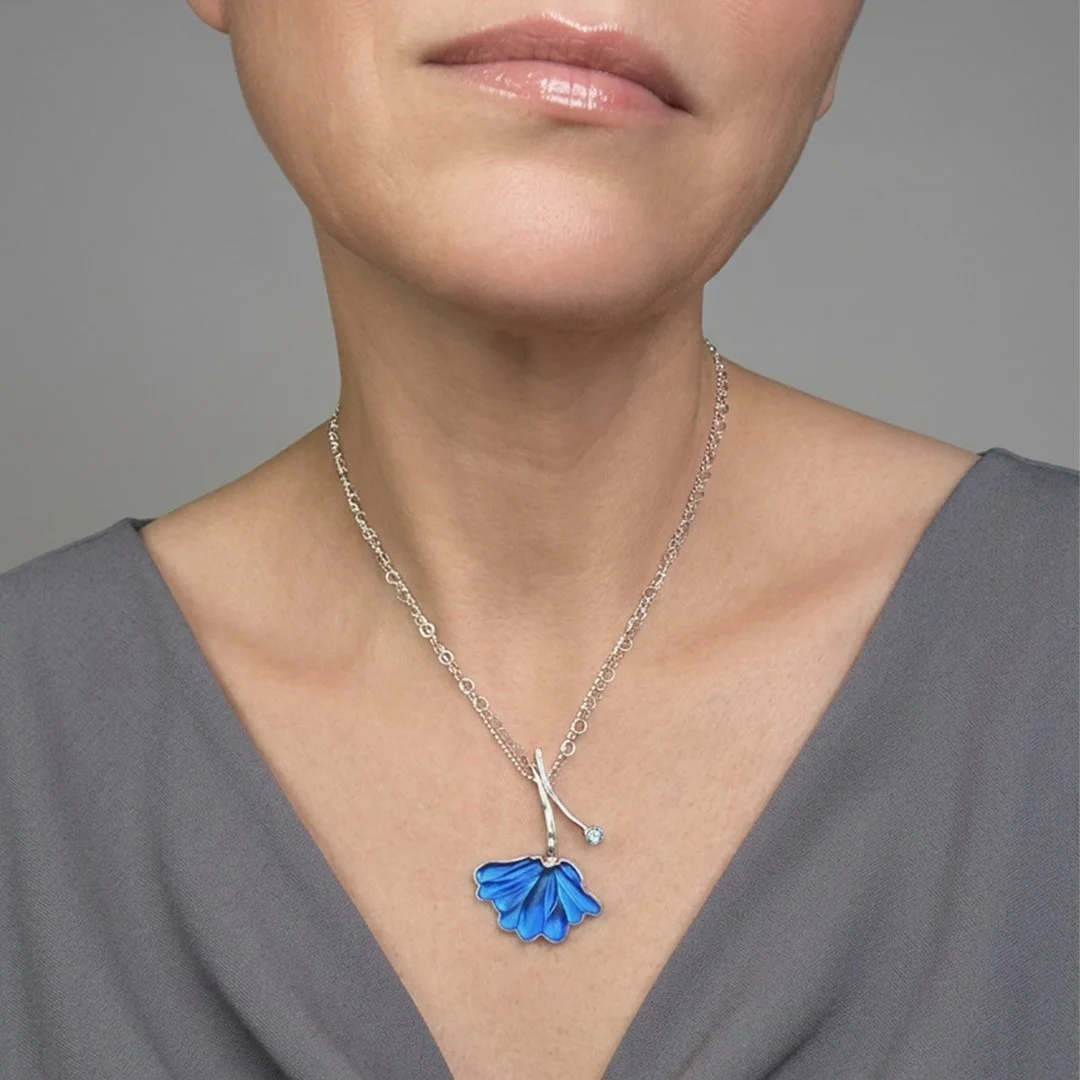 blue-bloom-and-bud-necklace-with-topaz-on-model.jpg