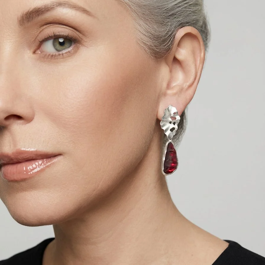 red-rain-earrings-on-model.jpg
