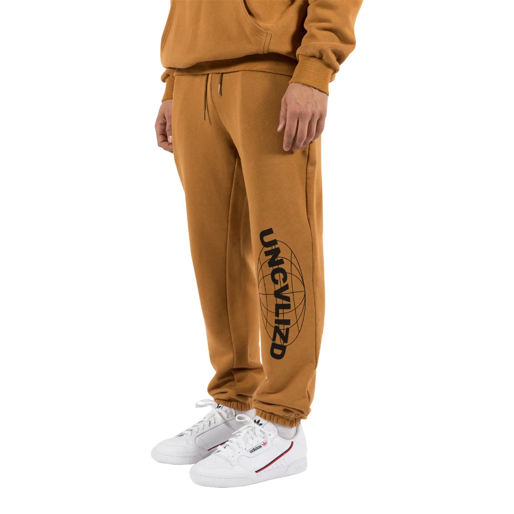 Uncvlizd+19+Globe+Sweats+Rust+Model.jpg