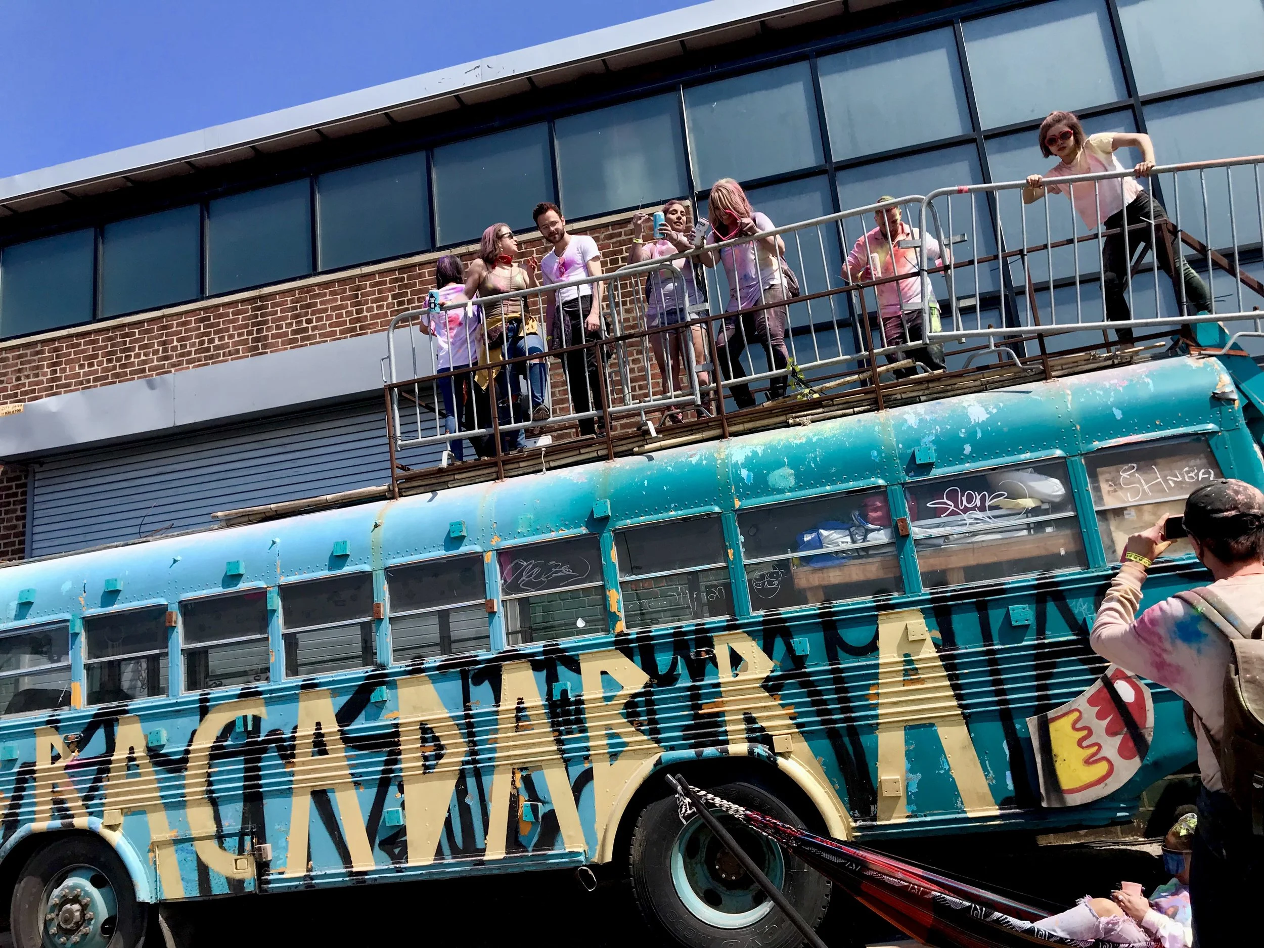 People made the most of the colorful event by getting their photos clicked on the Photo Bus.&nbsp;