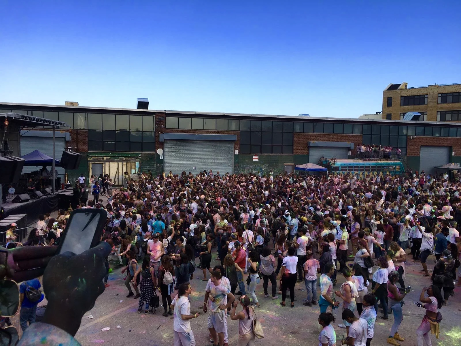 A view from the Photo Bus of the people dancing to the rhythm of Holi.&nbsp;