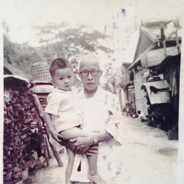 My dad in 1955 with his Granddad in Pahang.JPG