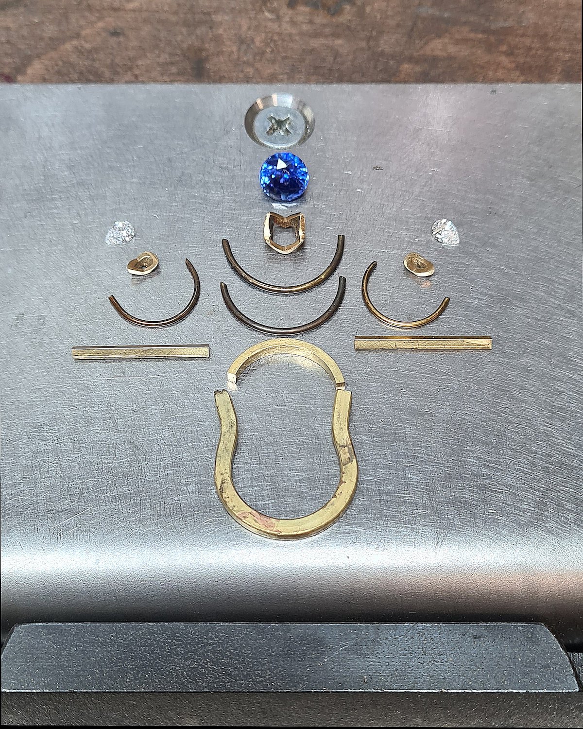 8b_ Sapphire and pear diamonds engagment ring on the make ©Amanda Li Hope.jpg
