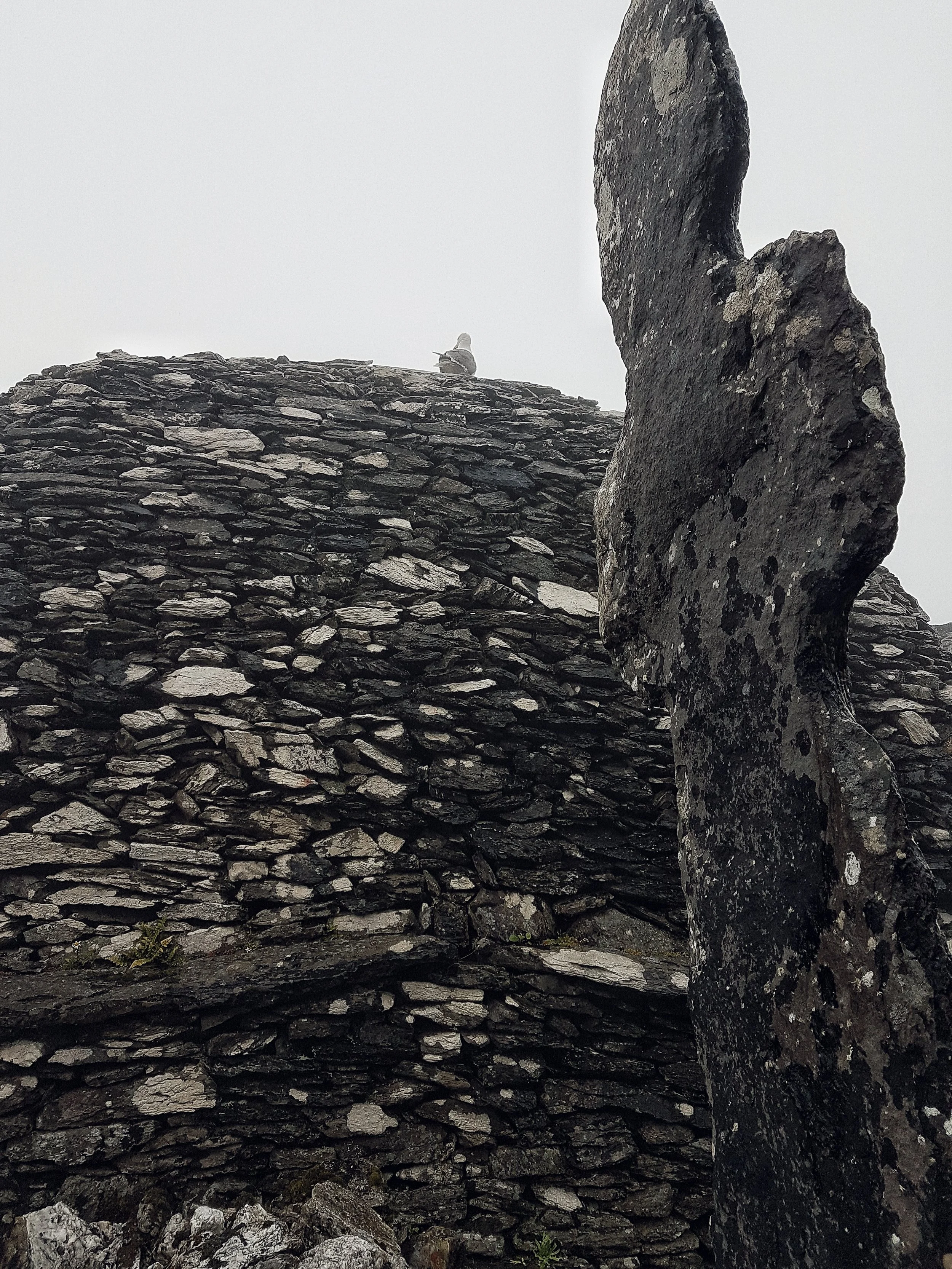 Cross and Beehive hut on Skellig Michael
