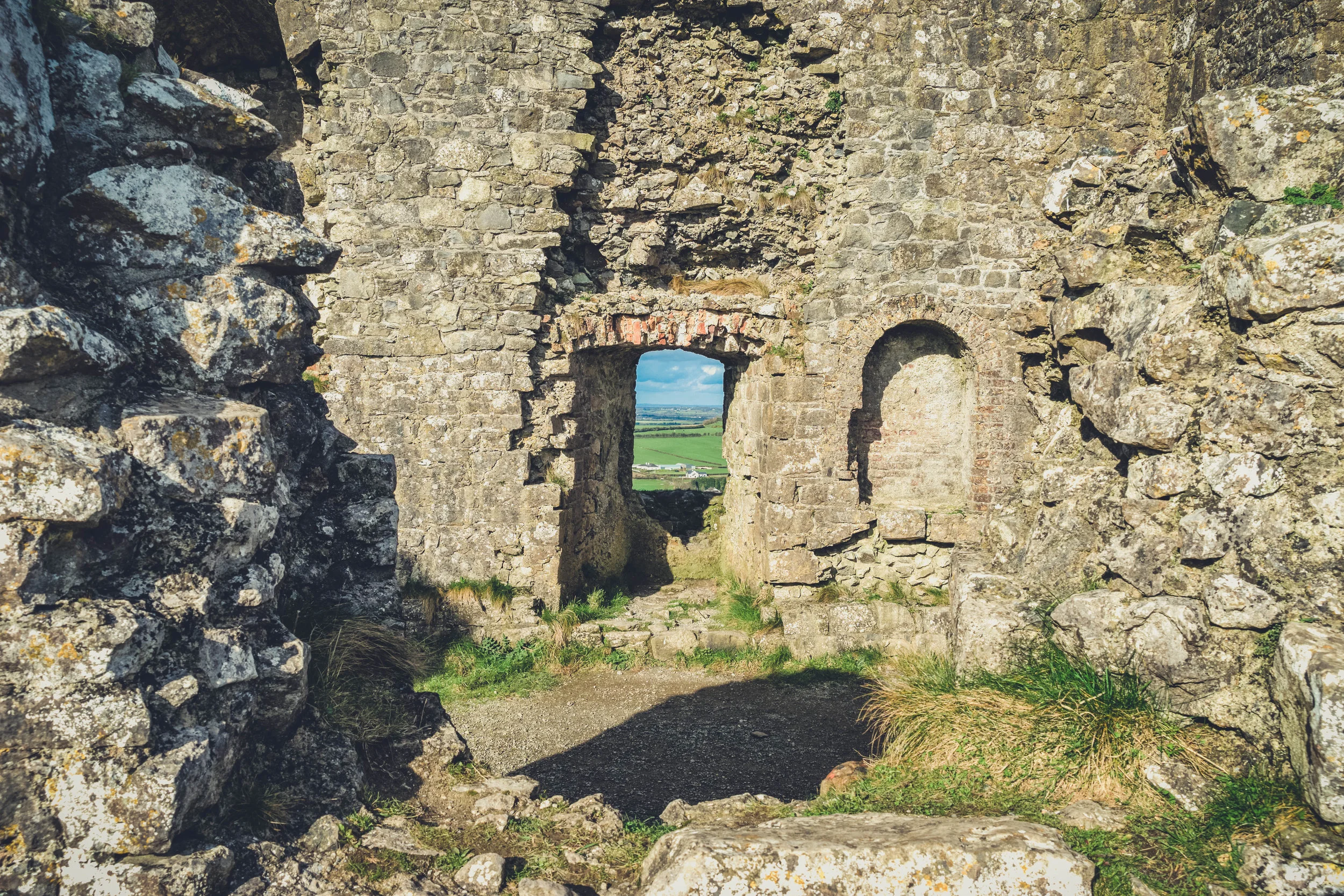 Ireland. Castle. Old castle. irish history. history. Rock of Dunamase. blue sky. rock. pathway. adventure. travel. irish counrty. castle doorway.jpg