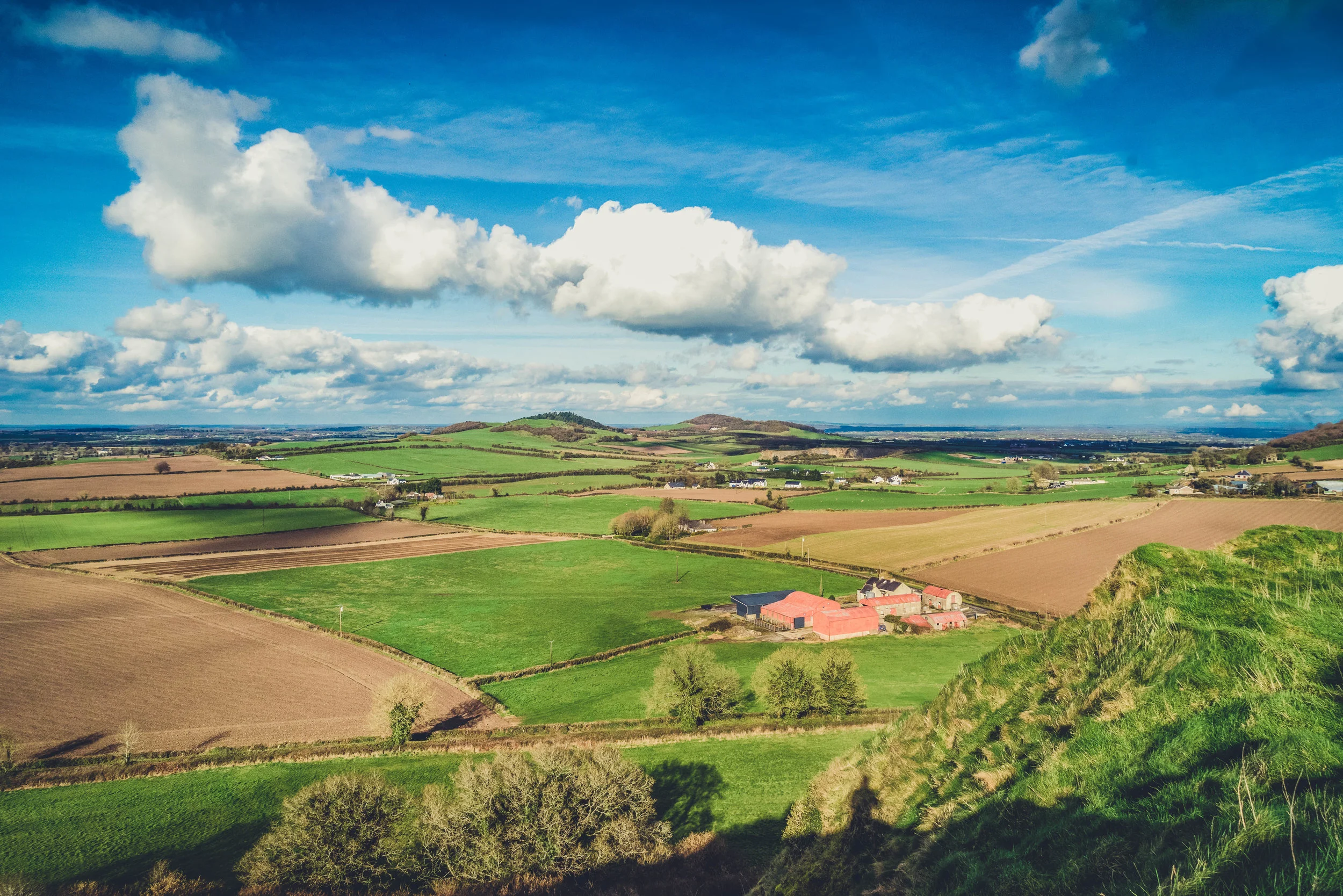 Ireland. Castle. Old castle. irish history. history. Rock of Dunamase. blue sky. rock. pathway. adventure. travel. irish counrty. green fields. farm land.jpg