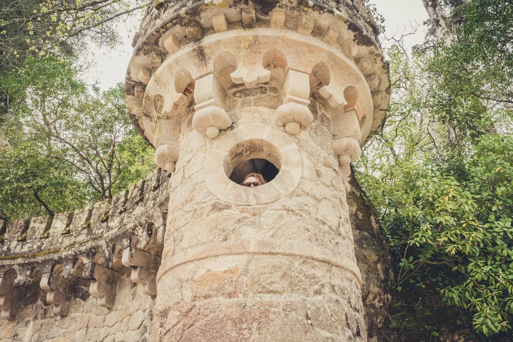 Portugal. Travel. Sintra. Sunshine. Hotel. History. view. room with a view. pena palace.  palace. town. old town. castle. castelo dos mouros. on the bridge. Convent of the Capuchos little window.jpg