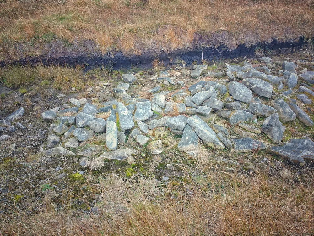 looking down at 6000 year old wall