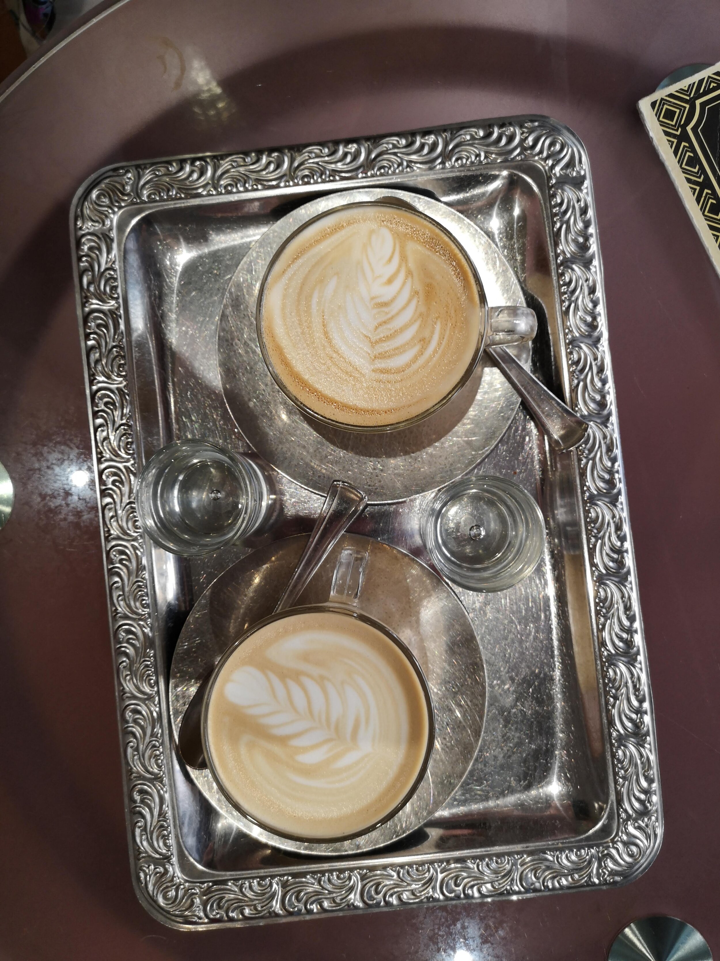 two lattes on silver tray.jpg
