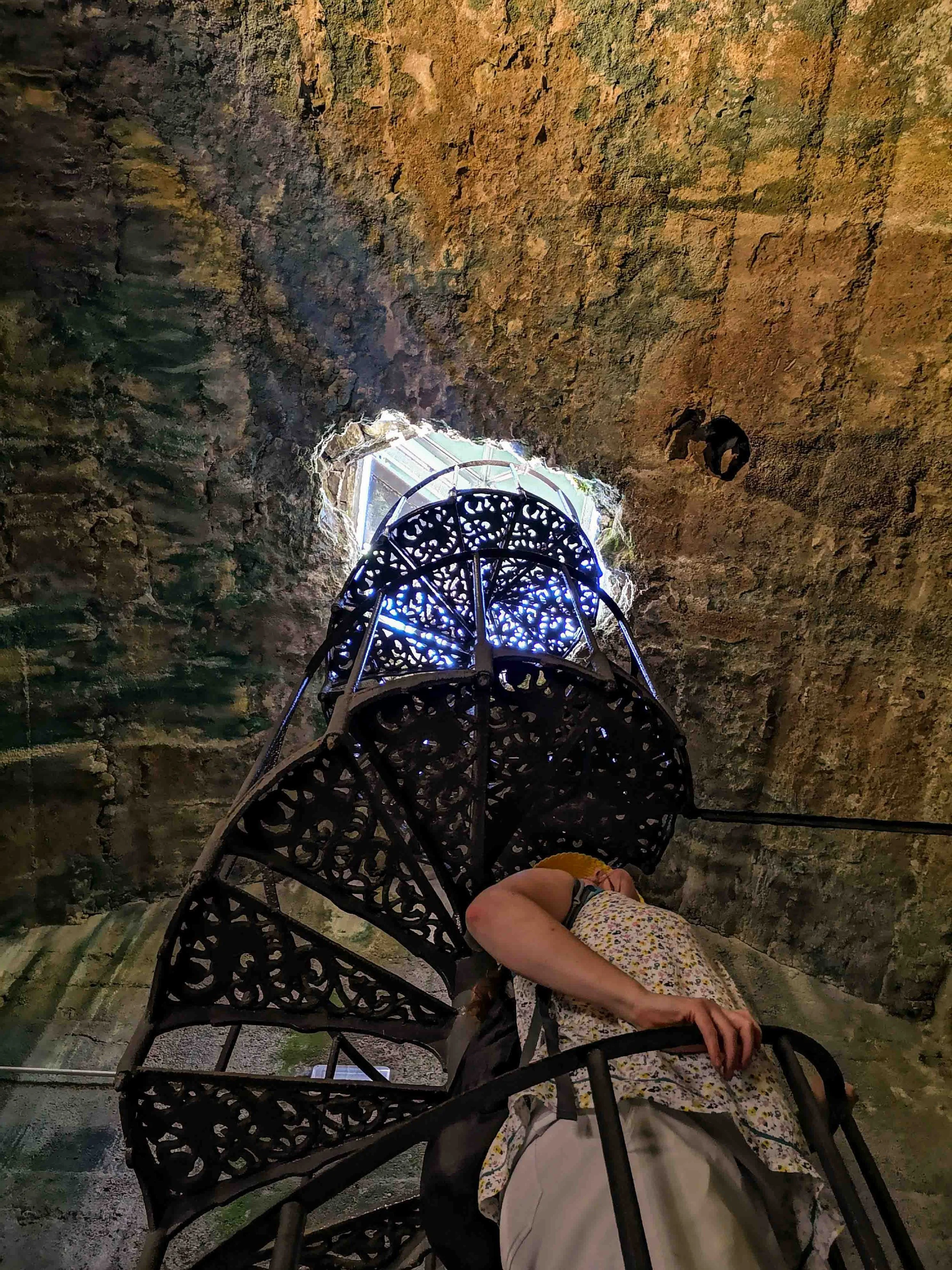 Winding stairs to Roman cistern Tuscany road trip.jpg
