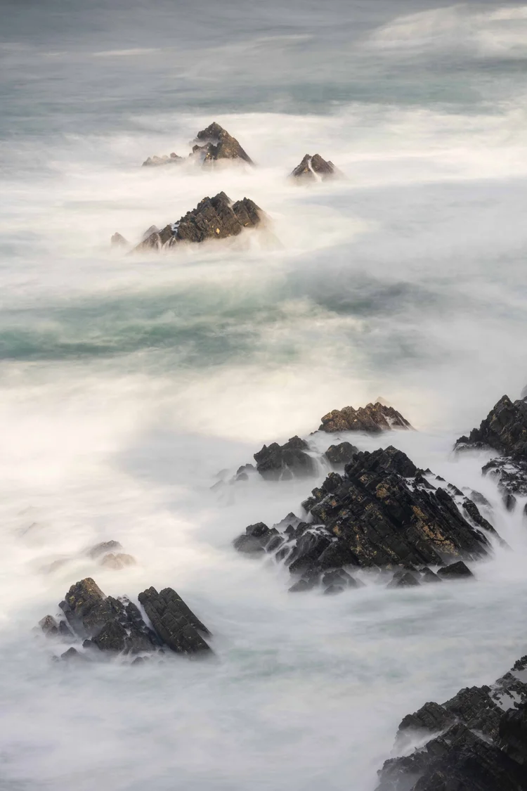 Water cascading over rocks with long exposure
