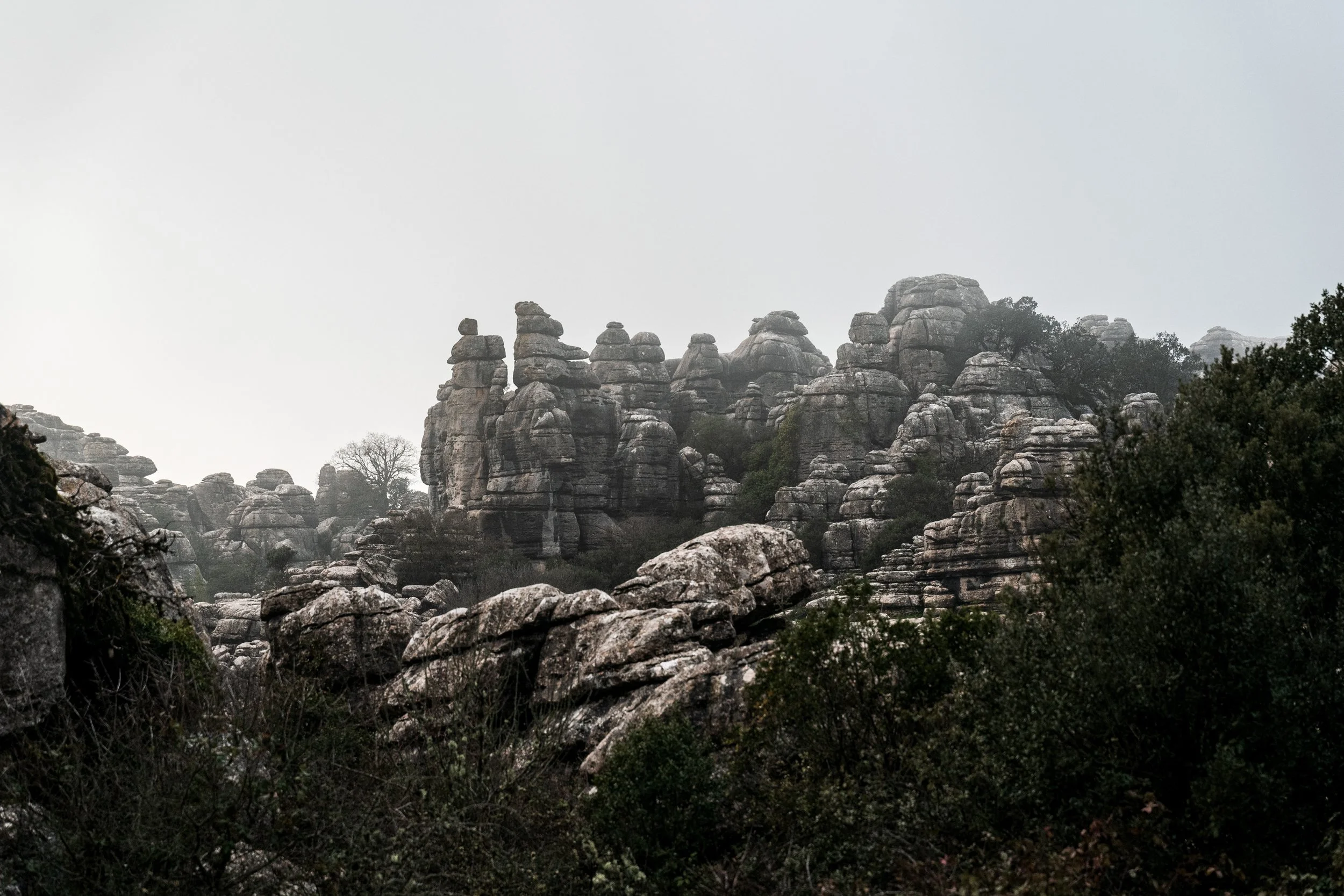 Group of hikers explore El Torcal's unique rock formations