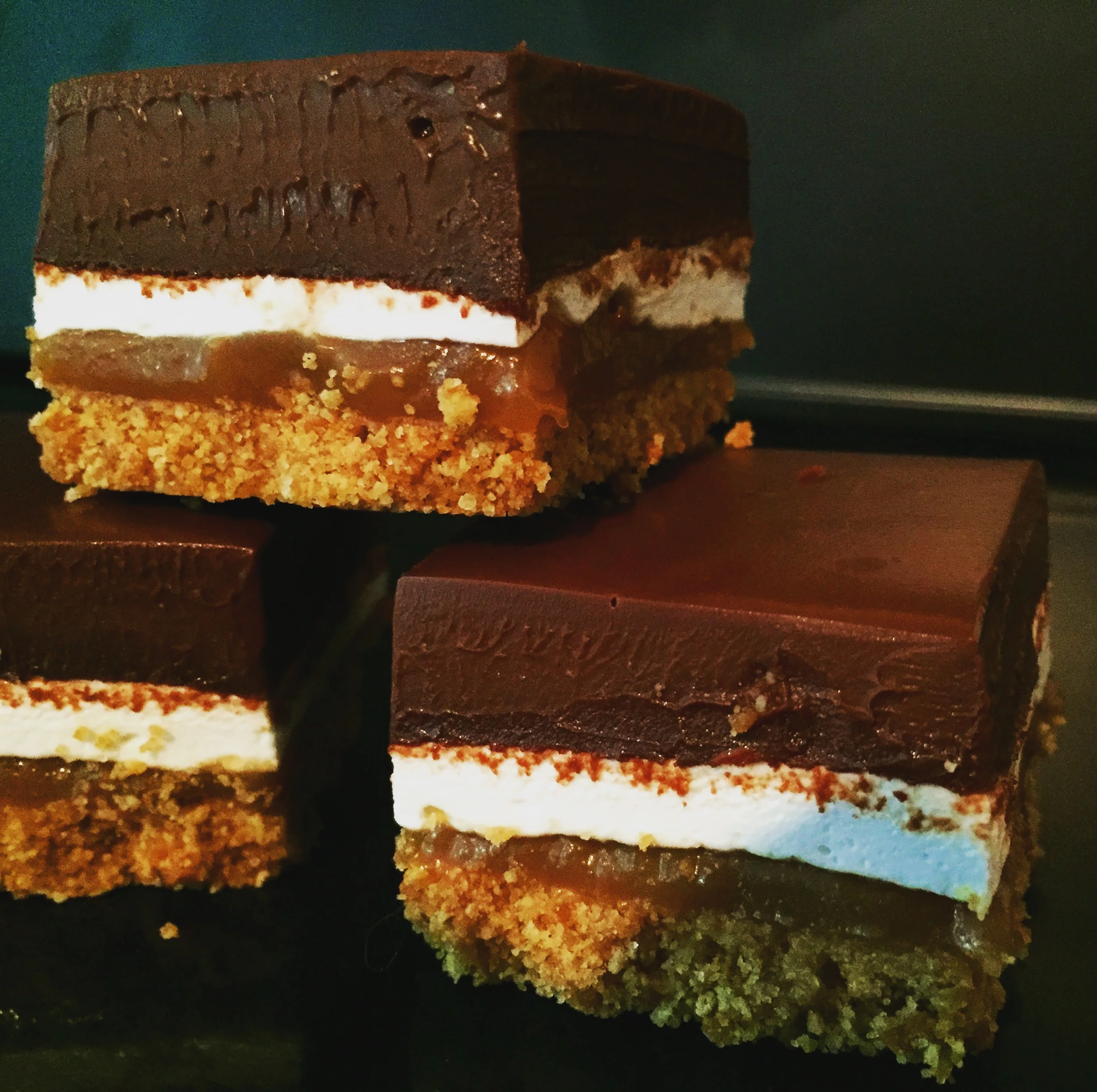S'mores Bars with Salted Caramel Sauce, Marshmallows and Dark Chocolate Ganache