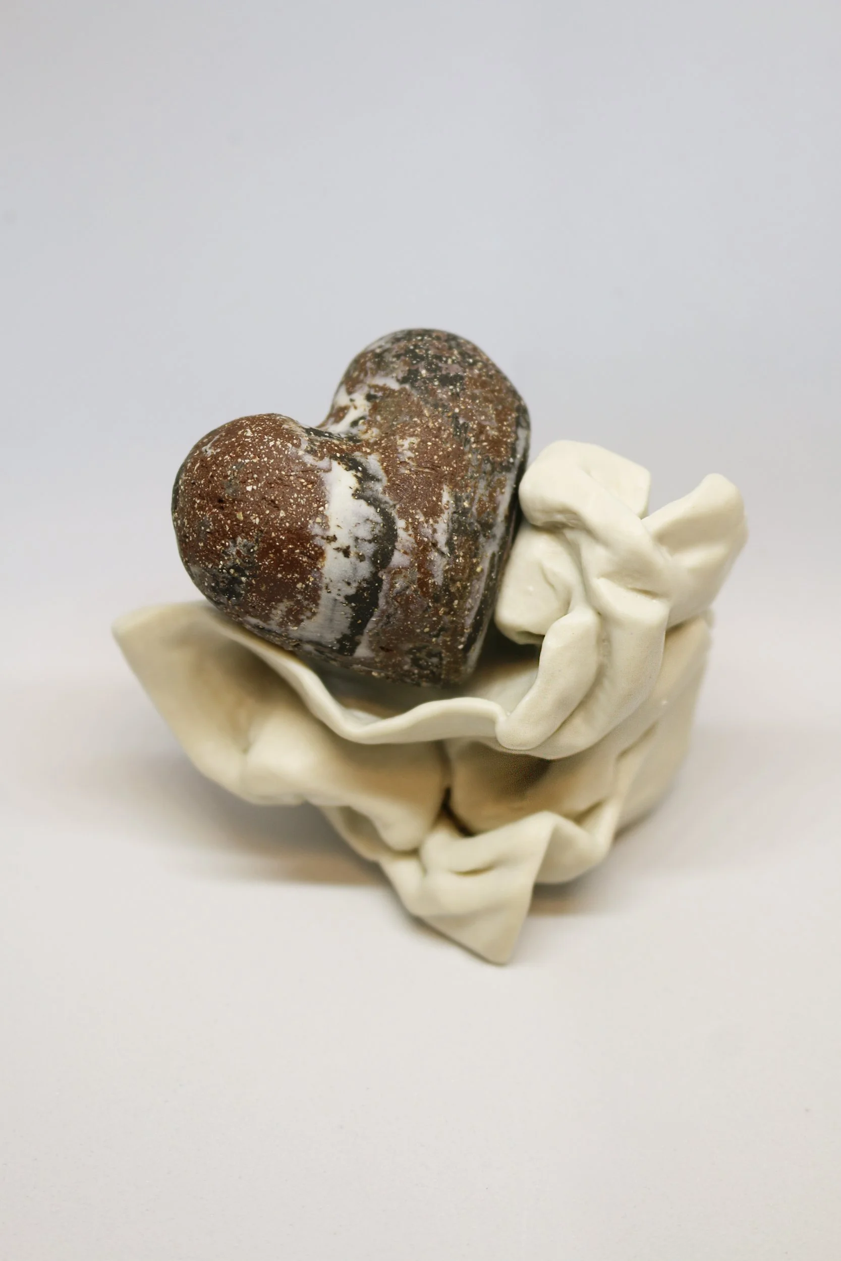  Crumple | earthenware, porcelain glaze |  2.75x3.25x2.5 inches 