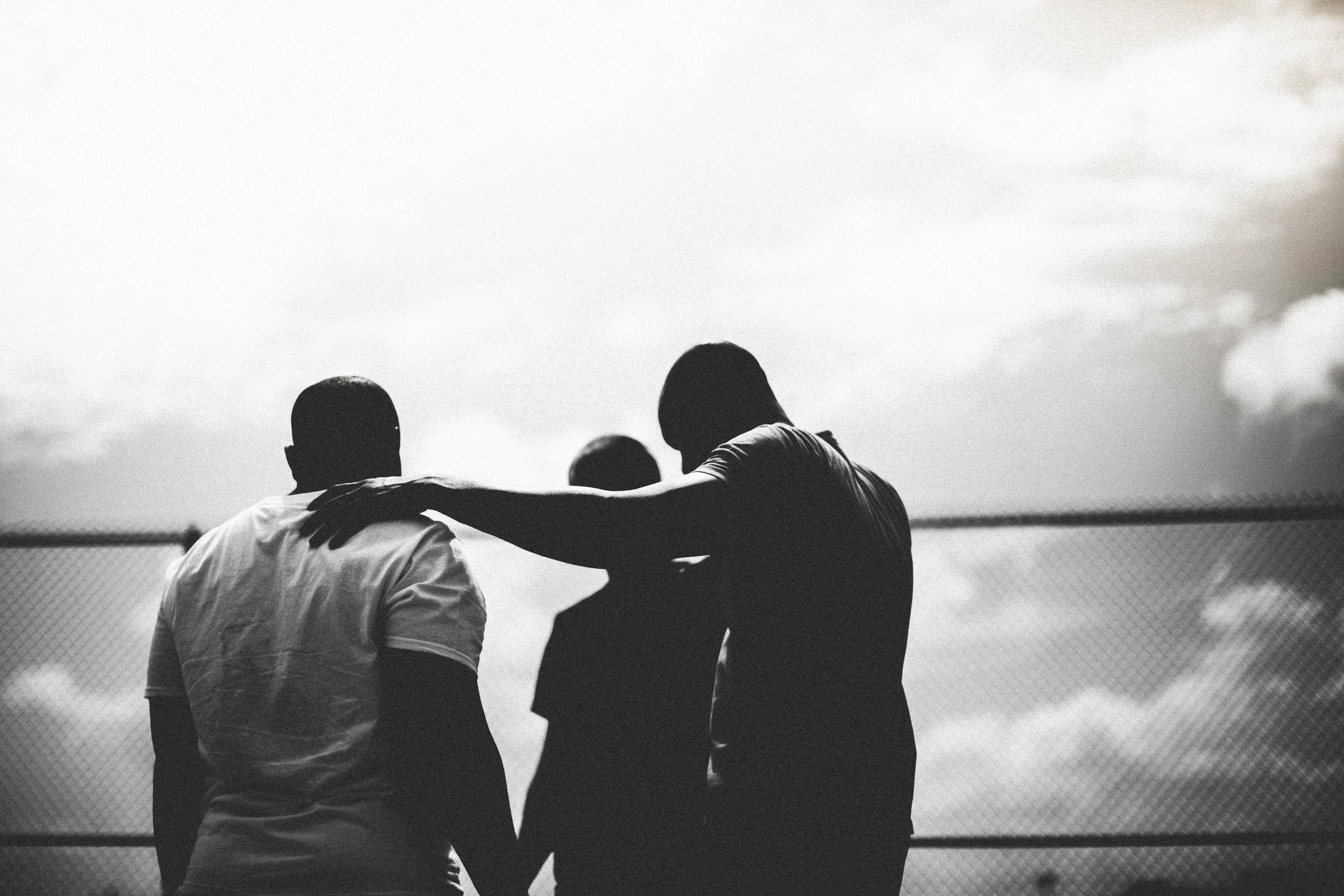 silhouette_of_men_in_a_huddle-3840x2560.jpg