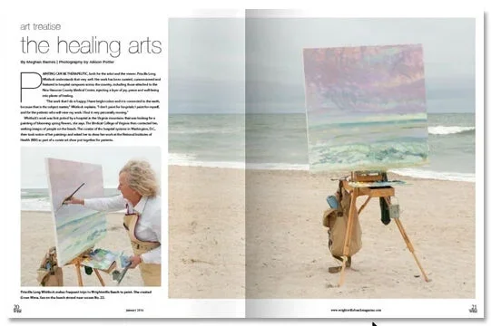 Priscilla working on a painting outdoors on a beach, with the ocean and sky in the background. The painting is on an easel, and the artist is painting a seascape with pastel colors.