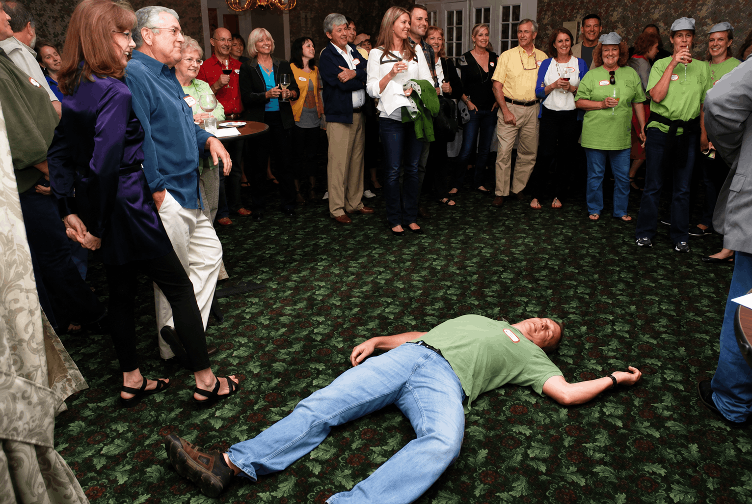 Guests enjoying an interactive corporate murder mystery event.