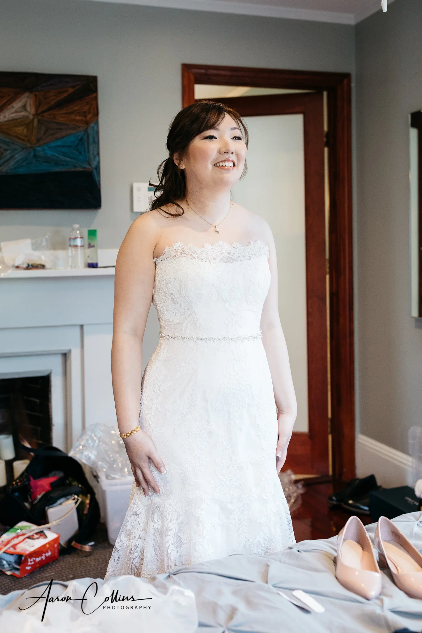 The bride feeling proud in her wedding dress.