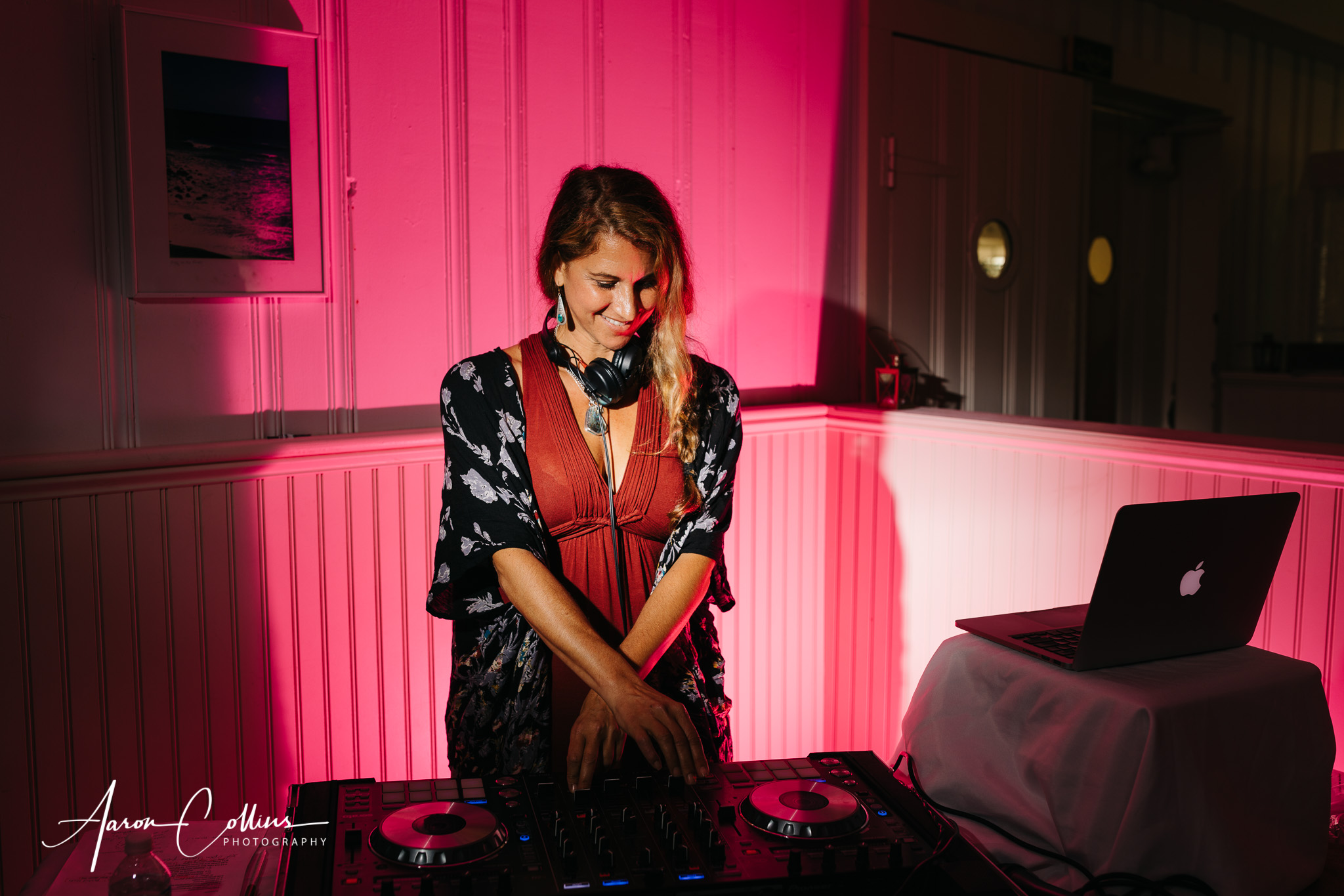 DJ Danielle C Duffy spinning the music at a wedding at Block Island Maritime Institute.