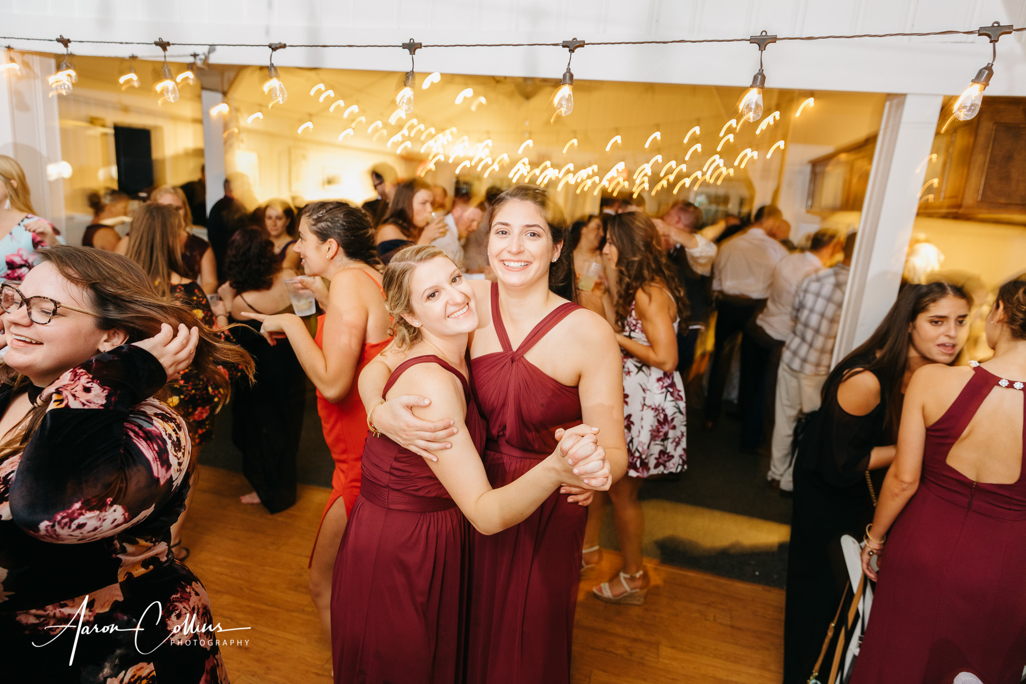 Bridesmaids dancing and having fun at BIMI wedding reception.