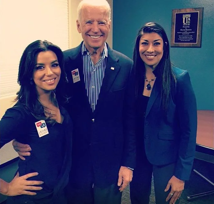 ( Western Mass News ) Lucy Flores (right) wrote her allegations in an essay for The Cut, an arm of New York Magazine, about Joe Biden (center). Here they are pictured with celebrity Democrat activist Eva Longoria (left) before the supposed incident occurred.