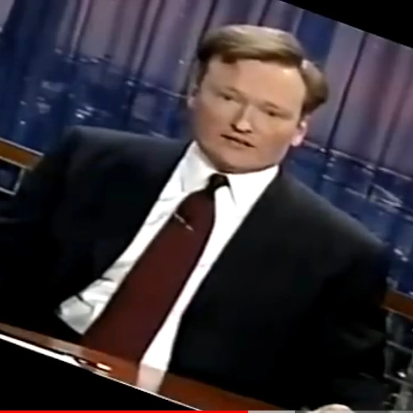 Square thumbnail from today’s show, Sunday, July 28, 2019, depicting a screenshot from a YouTube video of Conan O’Brien (sp?) in his first show monologue after the 9/11/01 terror attacks.