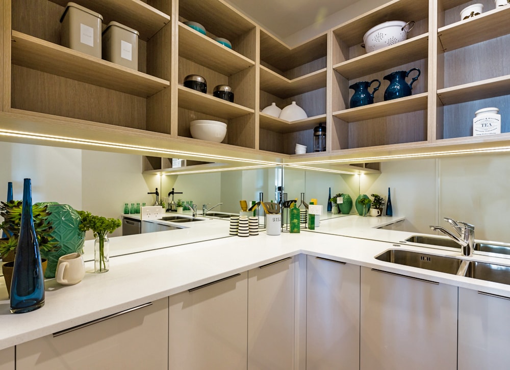 Mirrored glass splashback in scullery