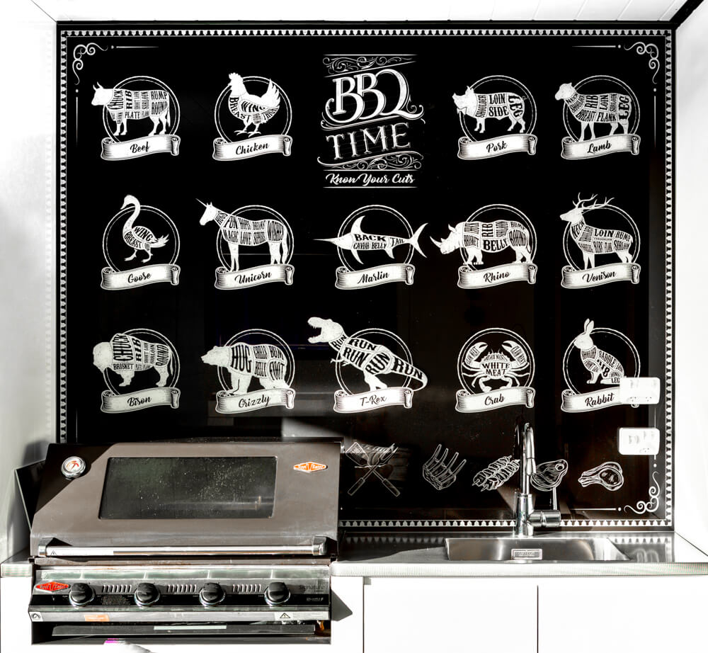 Black and white splashback showing different meat cuts for covered outdoor BBQ area