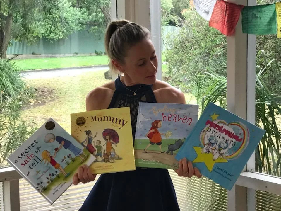 Naomi Hunter with books.jpg