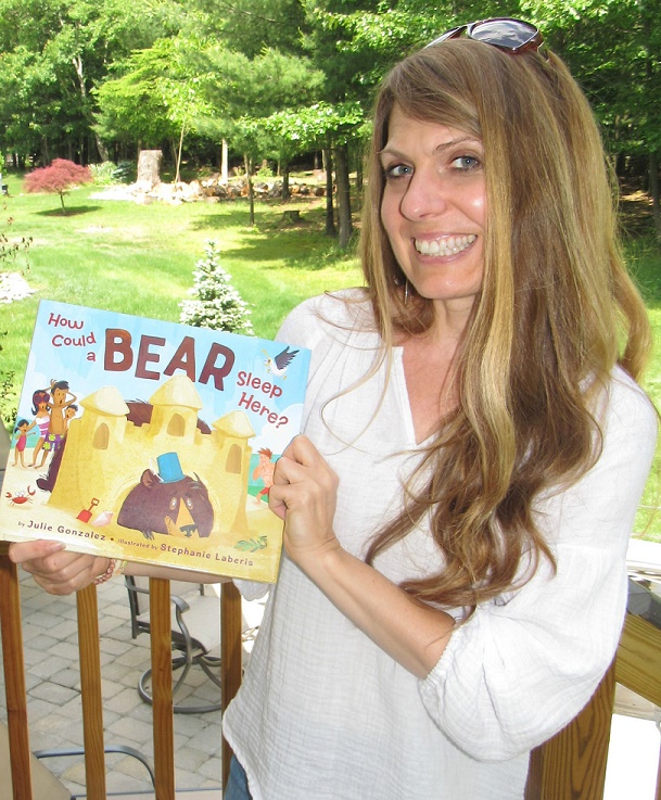 julie holding her first copy.jpg