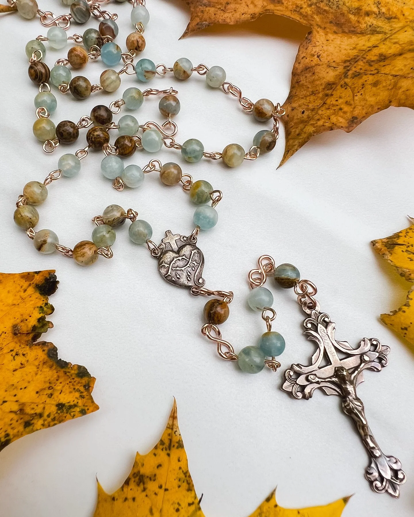 Bronze Sacred Heart rosary with aquatine calcite beads 🩵

I love the way these blue and brown beads pair with the bronze metal. It&rsquo;s a beautiful combination.

We&rsquo;re having our biggest sale of the year, you can find the details on our web