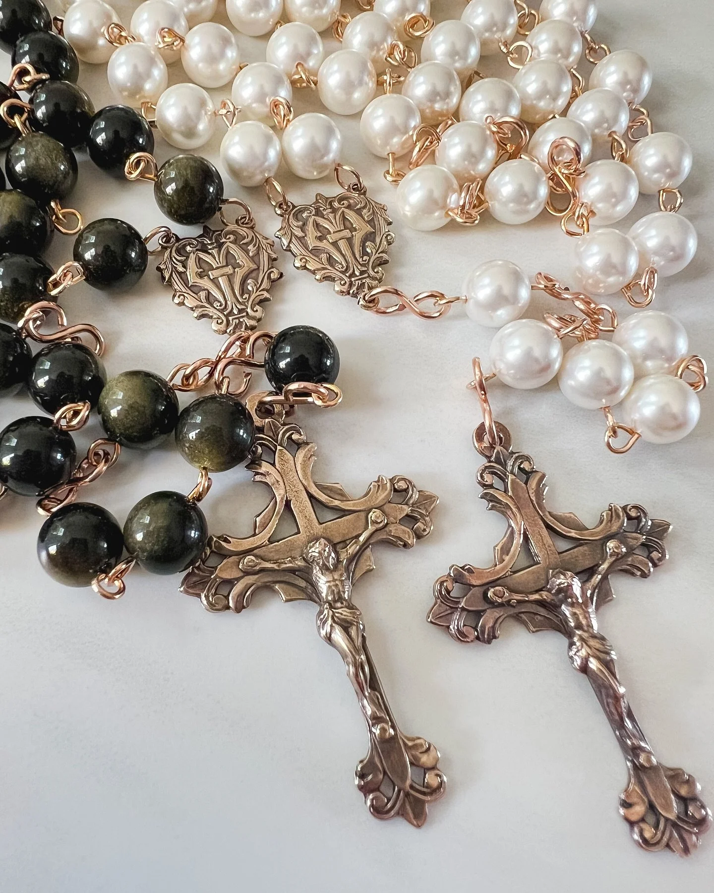 His &amp; Hers wedding rosaries ✨

While we have a couple popular bridal styles listed in our shop, you don&rsquo;t have to stick with those designs! This bride chose bronze with shell pearl and gold obsidian for their wedding rosaries. We love the v