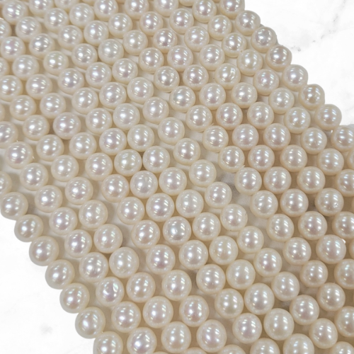 semi round freshwater pearl rosary beads