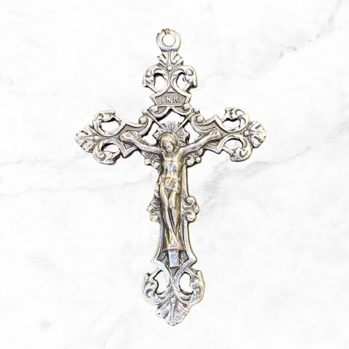 silver tone fleur de lis crucifix.png