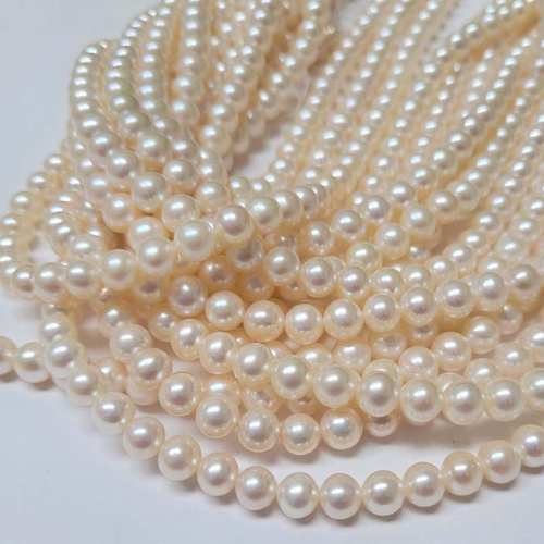 semi round freshwater pearl rosary beads