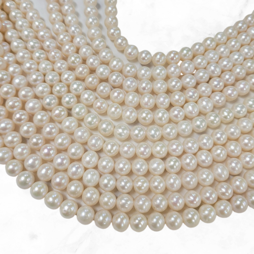 semi round freshwater pearl rosary beads