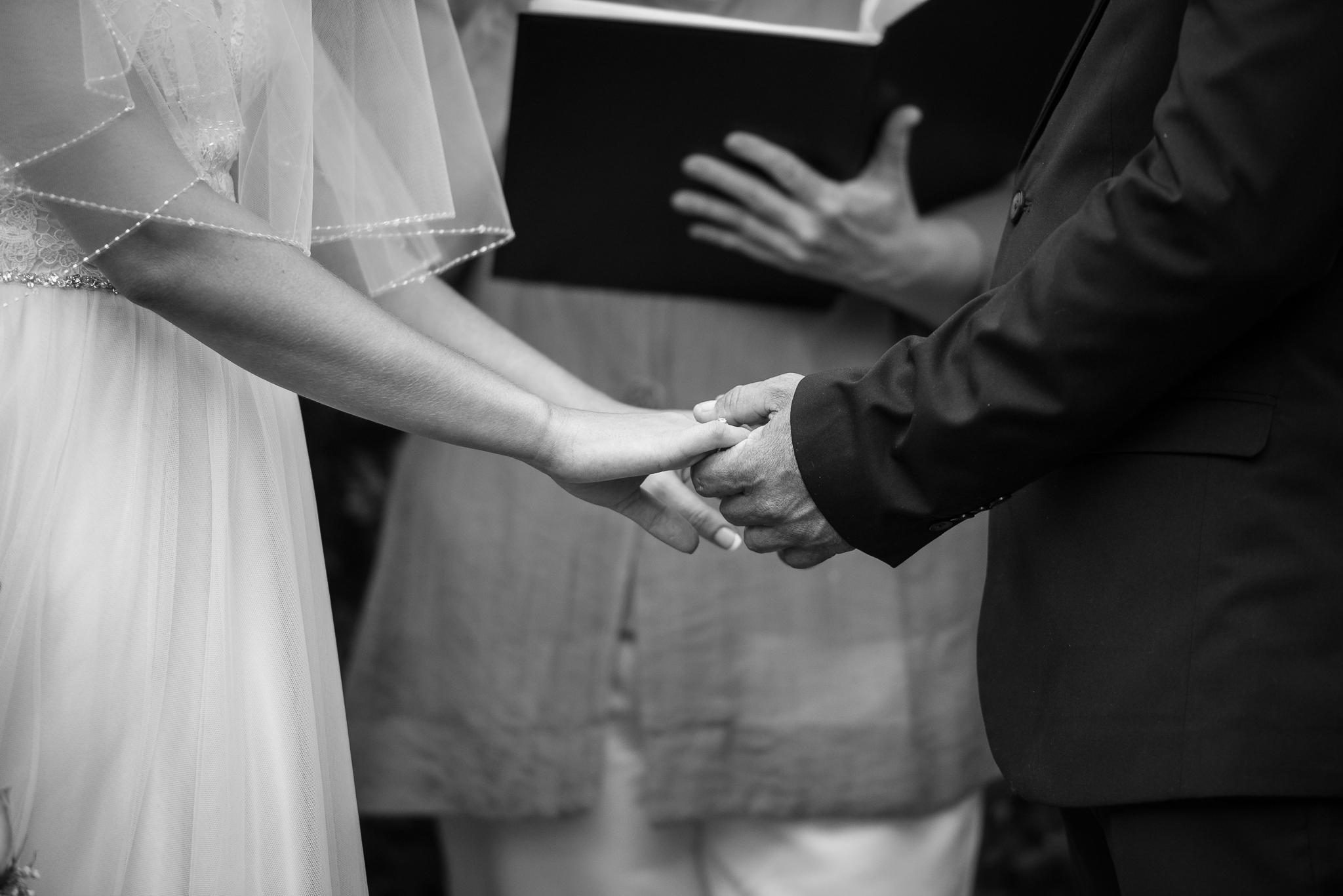 holding hands in black and white
