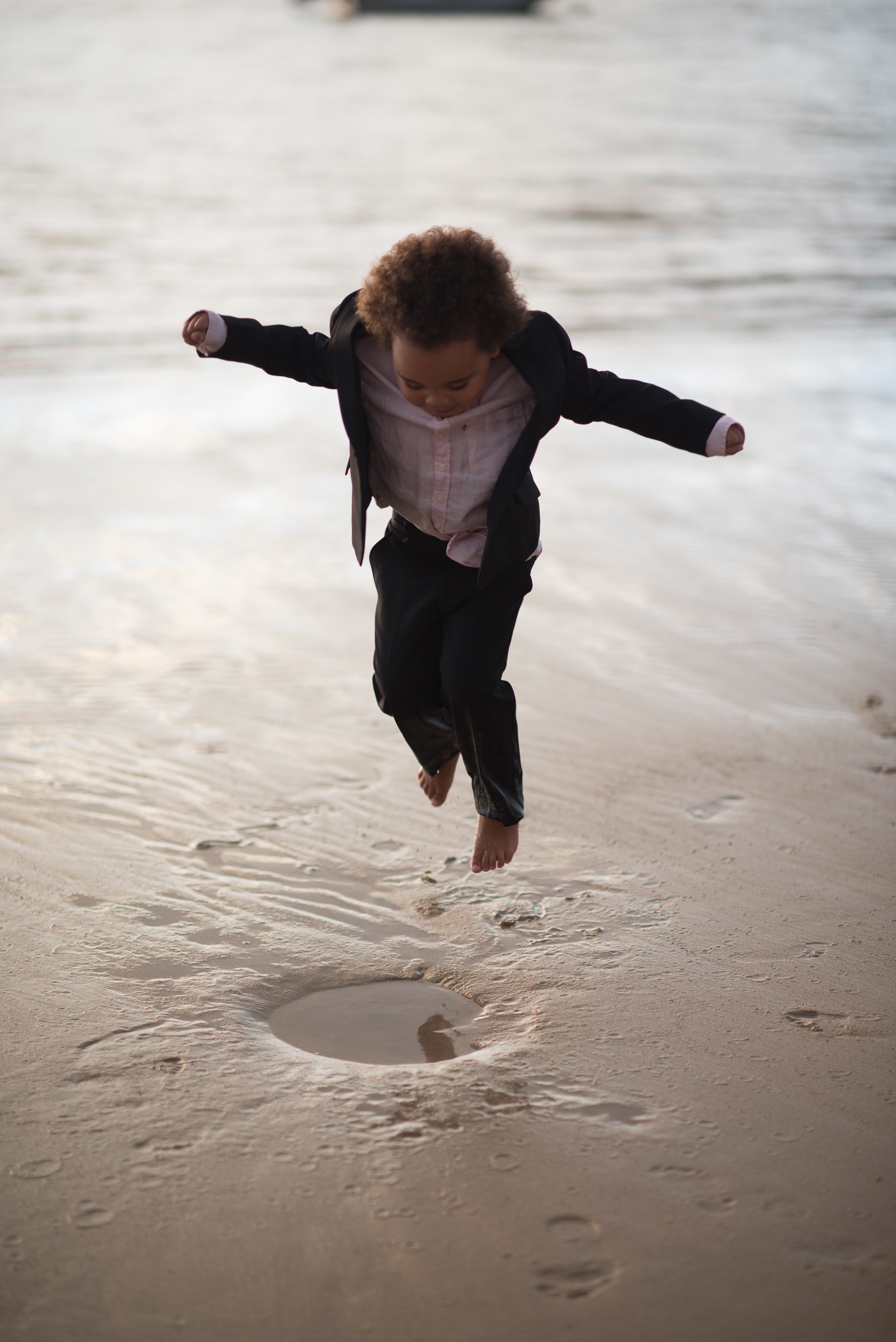 paige boy having fun during wedding photos